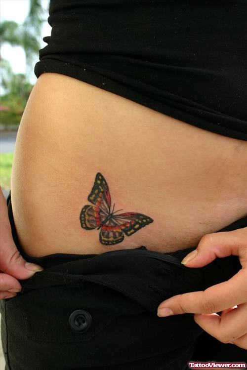 Girl showing Her Butterfly Tattoo