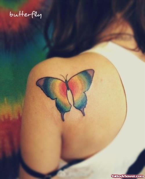 Colored Butterfly Tattoo On Girl Left Back Shoulder