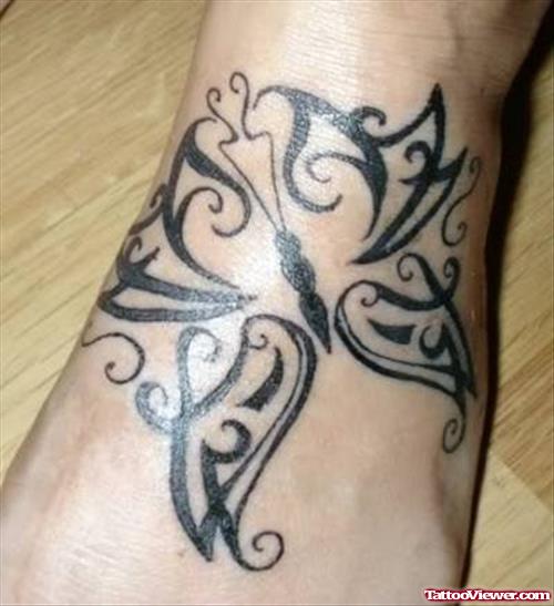Large Tribal Butterfly Tattoo On Left Foot