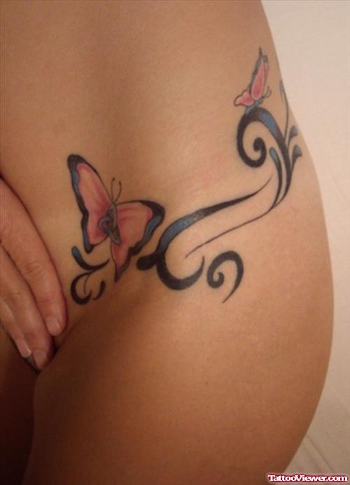 Hip Tribal And Butterfly Tattoo