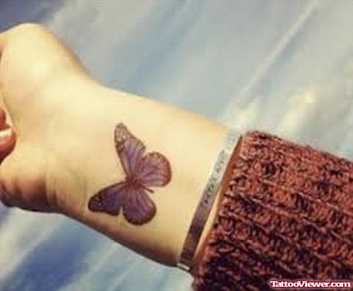 Butterfly Tattoo On Right Wrist