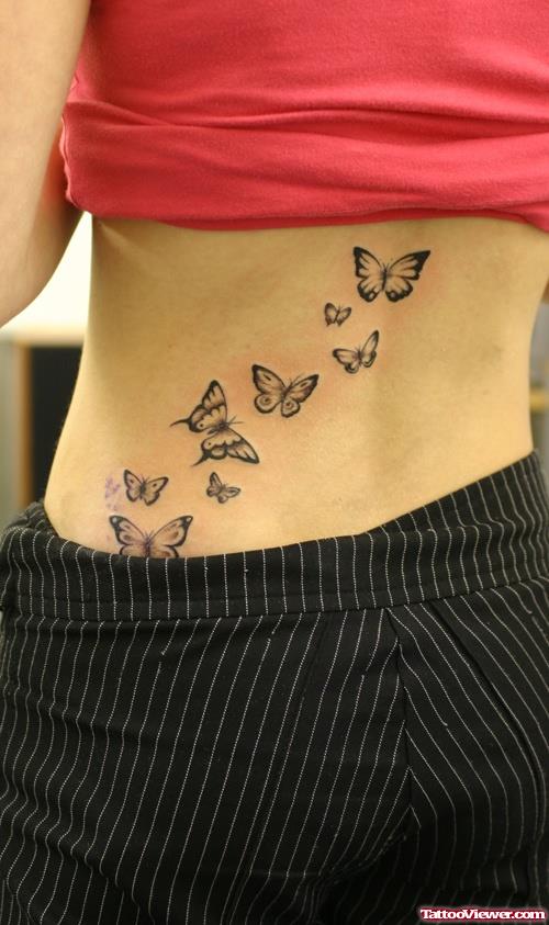 Butterfly Grey Ink Tattoos On Lowerback