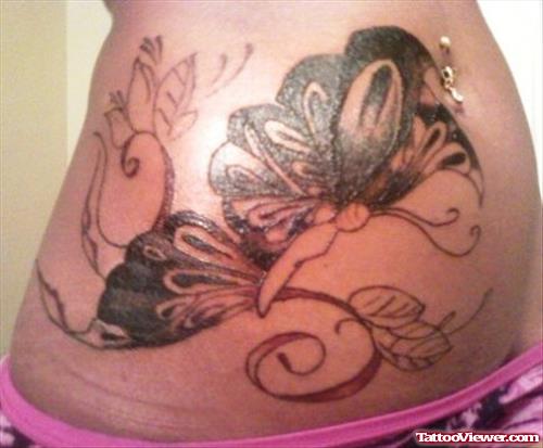 Black Butterfly Tattoo On Right Hip