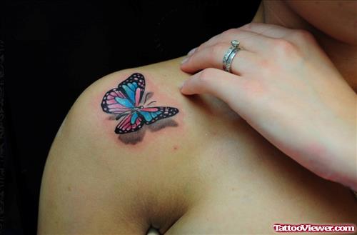 Colored Ink Butterfly Tattoo On Right Shoulder