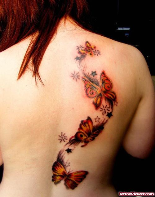 Awesome Colored Butterfly Tattoo On Girl Back Body