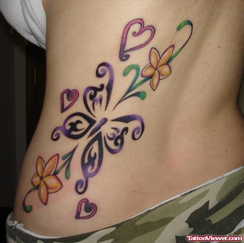Yellow Flowers And Purple Butterfly Tattoo On Side