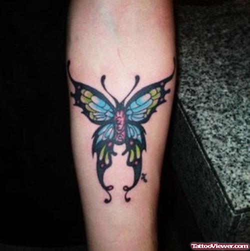 Unique Colored Butterfly Tattoo On Arm