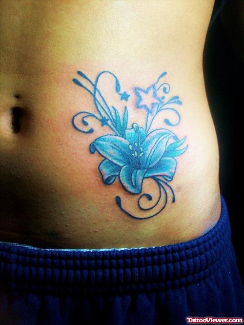 Blue Flowers Butterfly Tattoo On Left Hip