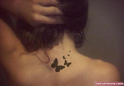 Black Butterflies Tattoo On Back Neck
