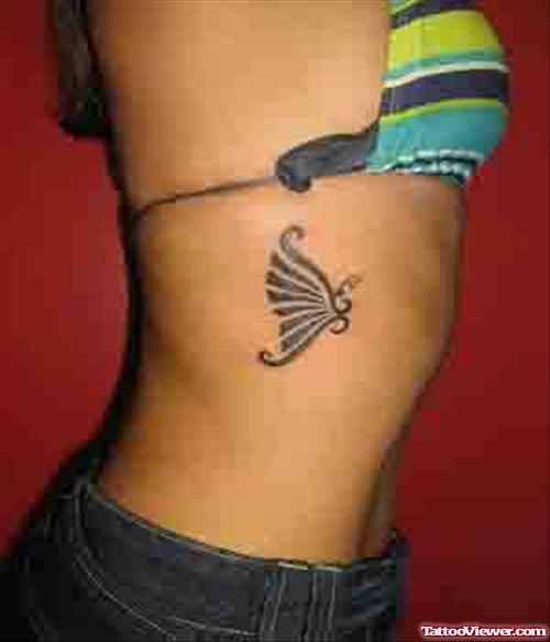 Awesome Tribal Butterfly Tattoo On Side Rib