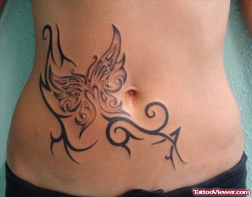 Awesome Tribal And Butterfly Tattoo On Hip