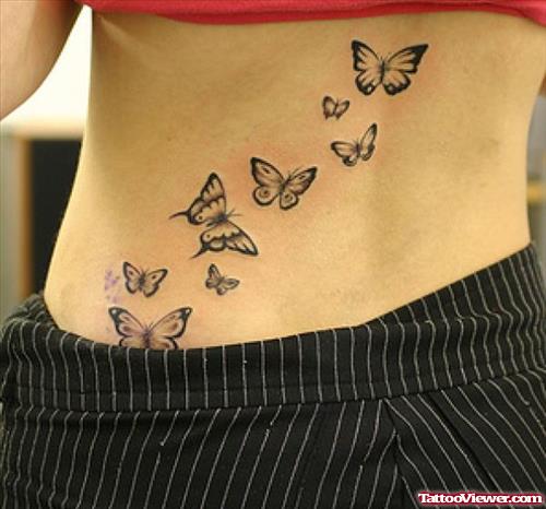 Black Ink Butterfly Tattoo On Back
