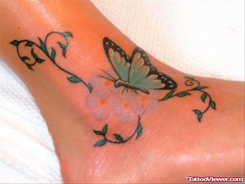 Awesome Blue Ink Butterfly Tattoo On Ankle