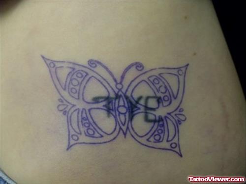 Amazing Blue Ink Butterfly Tattoo On Lowerback
