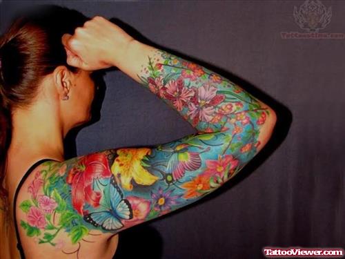 Color Ink Flower And Butterflies Tattoos On Sleeve