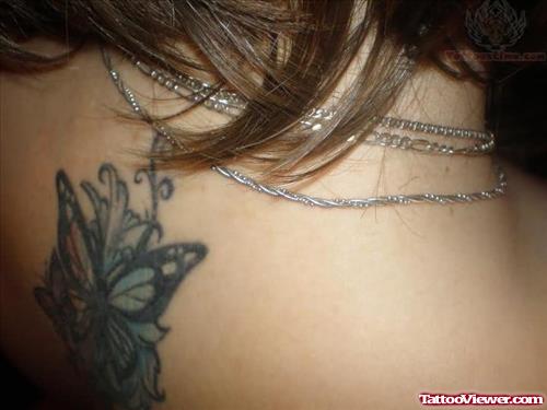Color Butterfly Tattoo On Upperback