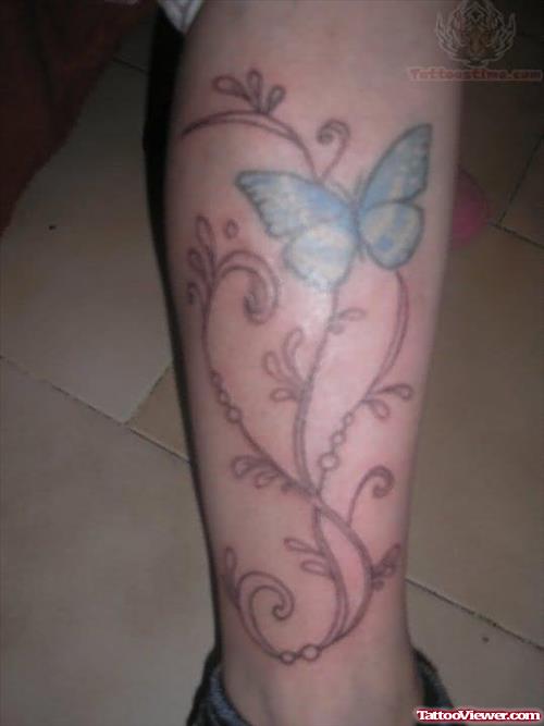 Blue Butterfly Tattoo On Leg