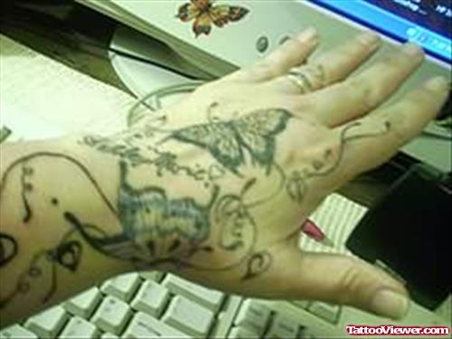 Black Butterflies Tattoos On Hand & Arm