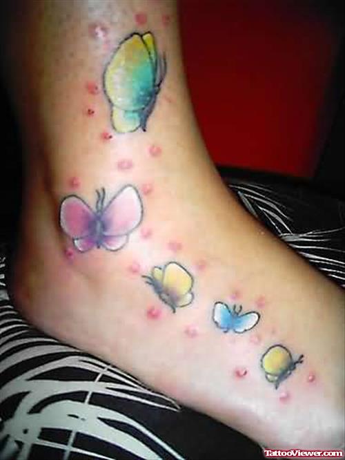 Lovely Butterlies Tattoos On Foot