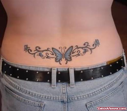 Butterfly Colourful Tattoo On Lower Back