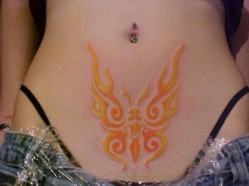 Yellow Tribal Butterfly Tattoo On Belly