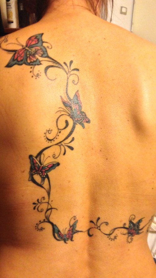 Colored Butterflies Tattoos On Back Body