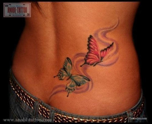 Red And Blue Butterflies Tattoos On Girl Back