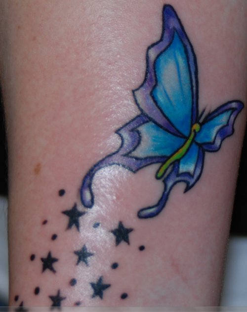 Stars And Blue Butterfly Tattoo On Arm