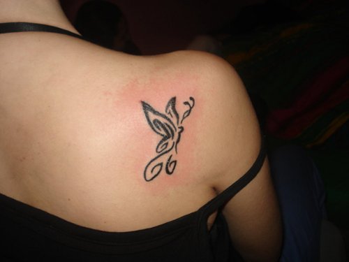 Small Tribal Butterfly Tattoo On Girl Back Shoulder