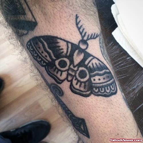 ink butterfly tattoo on leg