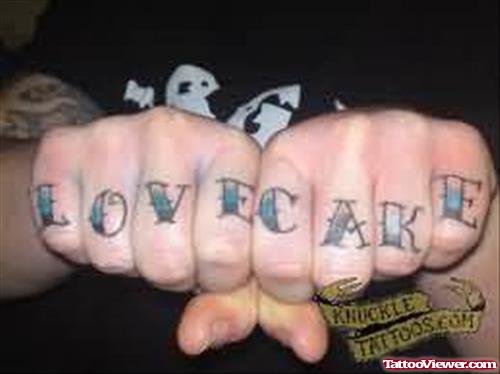 Love Cake Tattoo On Fingers