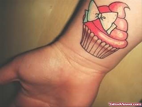 Cake Gift Tattoo On Wrist