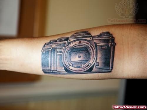 Large Camera Tattoo On Left Arm