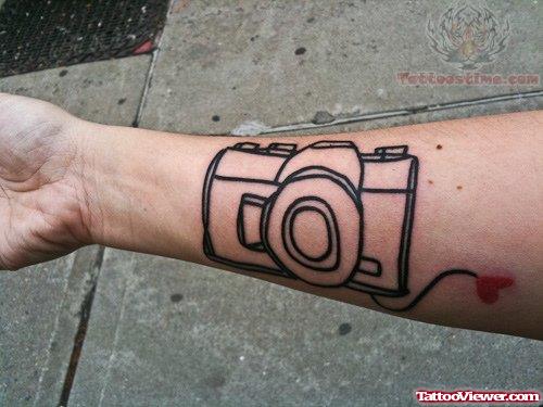 Camera Outline Tattoo On Wrist