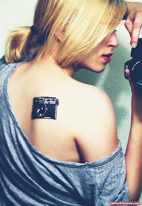 Black Camera Tattoo On Back