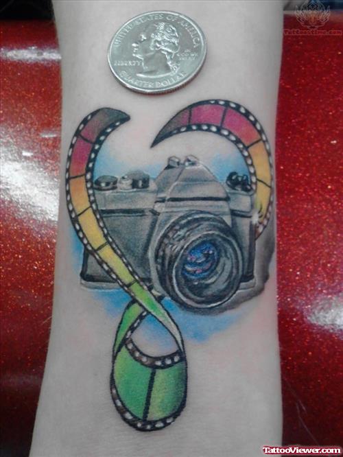 Color Ink Camera Tattoo On Arm