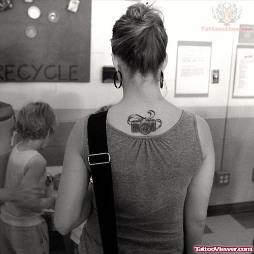 Camera Tattoo On Girl UpperBack