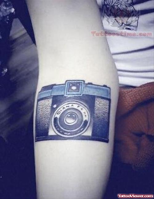 Camera Tattoo On Arm For Young