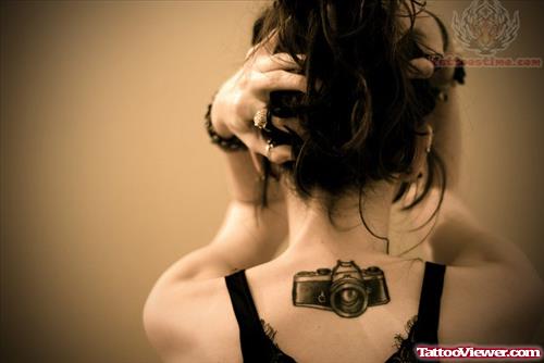 Camera Tattoo On Girl Upper Back