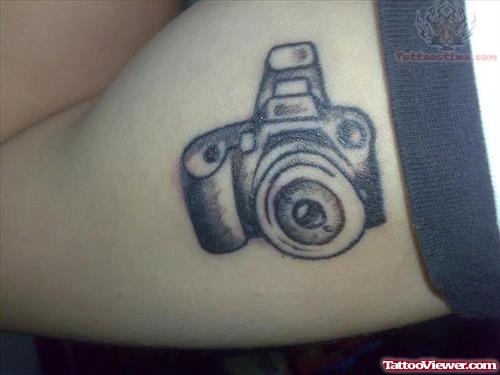 Camera Tattoo On Muscle