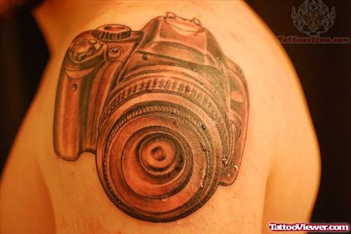 Camera Tattoo On Upper Shoulder