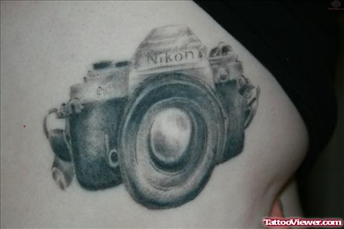 Nikon Camera Tattoo On Rib