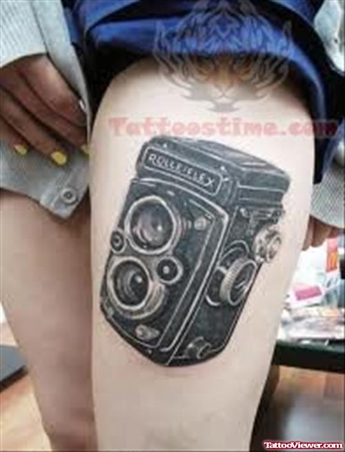 Video Camera Tattoo On Thigh