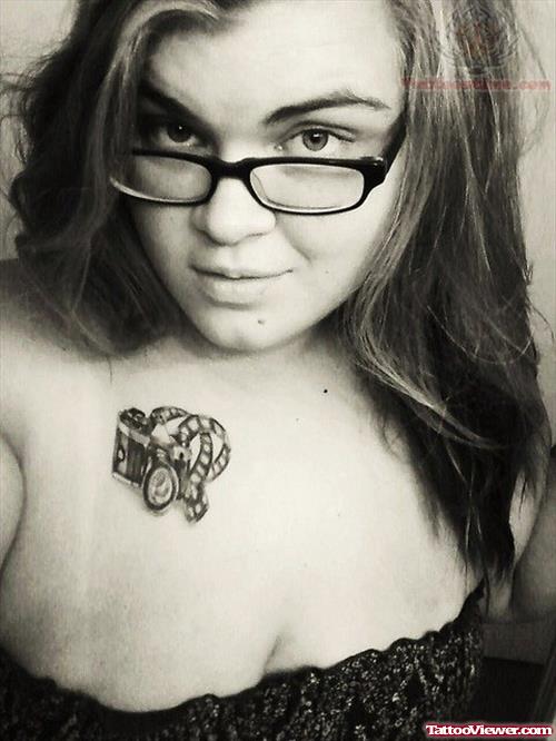 Camera Tattoo On Girl Chest