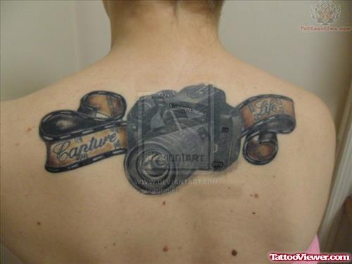 Canon Camera And Photograph Film Tattoo On Back
