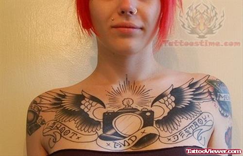 Winged Camera Tattoo On Chest