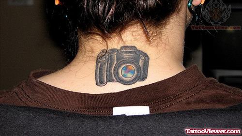 Color Camera Tattoo On Back Neck