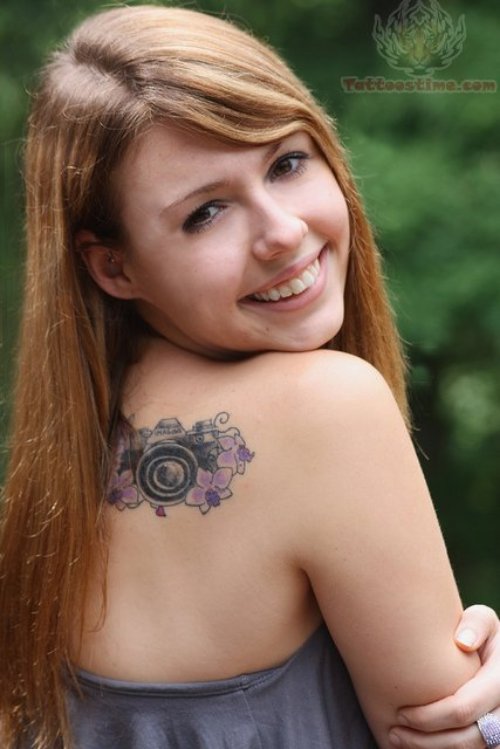 Beautiful Camera Tattoo On Girl Back