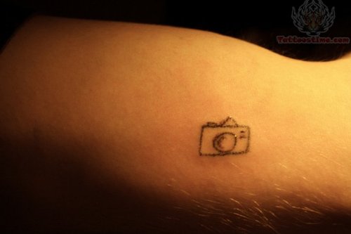 Small Camera Tattoo On Muscles