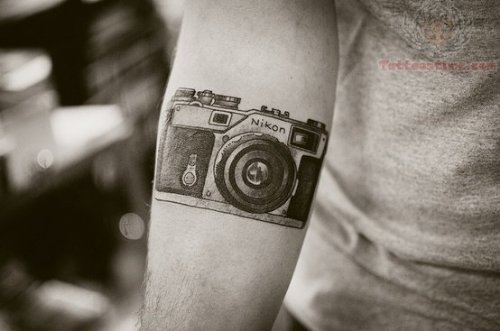 Nikon Camera Tattoo On Arm